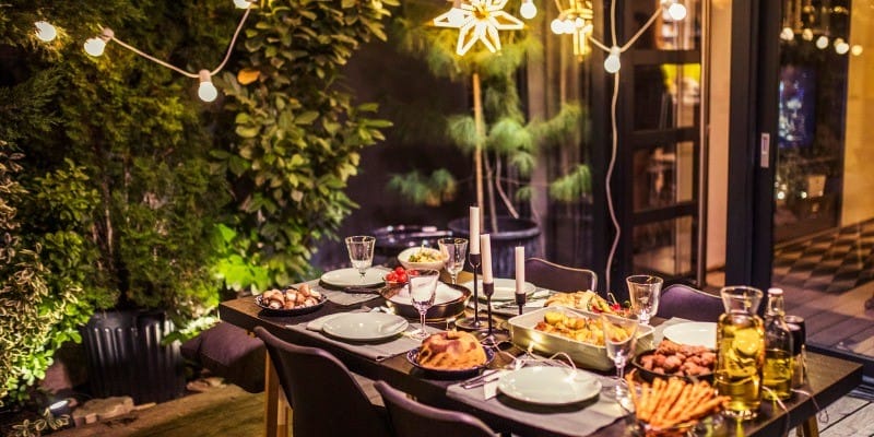 Outdoor table at night with lights